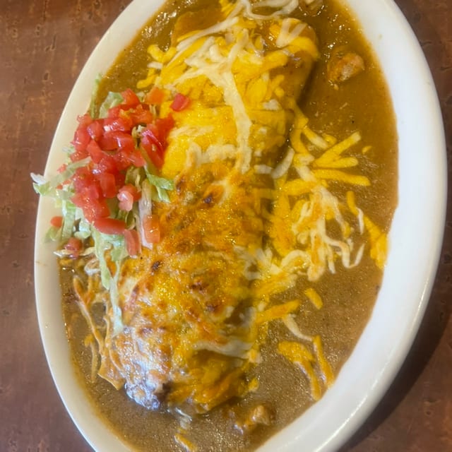 Chile Relleno Burrito With Beans Smothered.